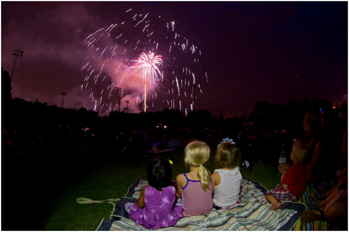 Kids watching fireworks